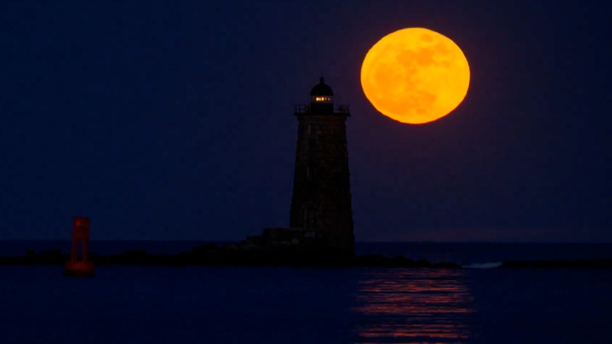 watch: first full moon of may rises like a blooming